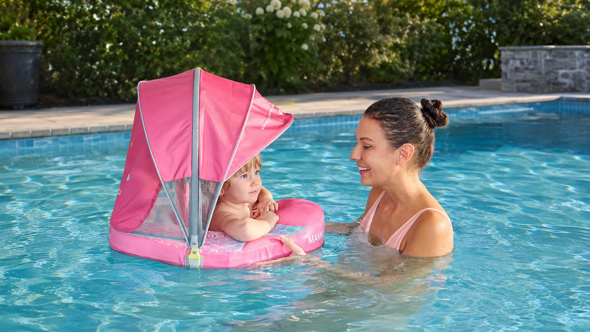 Mambobaby baby float in a pool with a parent providing close, within-arm’s-reach supervision