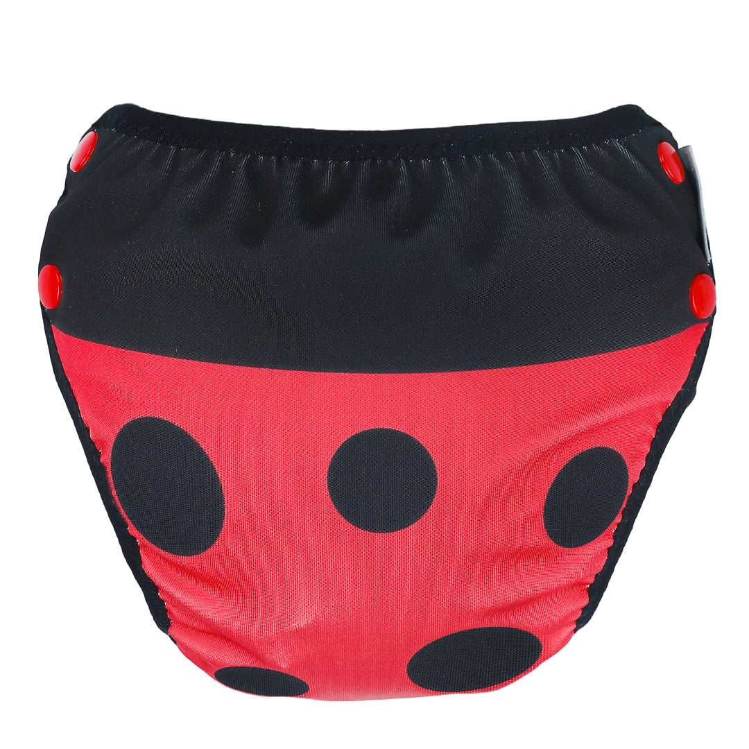 Red and black polka dot diaper with red buttons on a white background