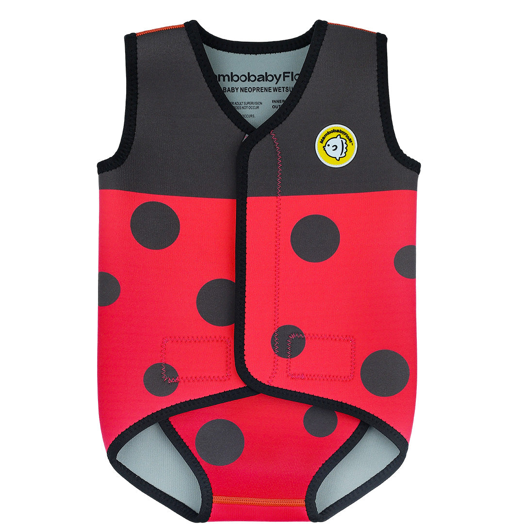 A baby neoprene wet blanket vest in a red and black ladybug print, featuring a black collar and trim, a yellow circular logo patch on the chest, and a gray interior lining.
